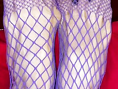 Really bsiley jay legs with tiny feet with long toes in Purple fishnet stocking