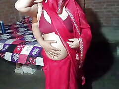 Laal Sari me bhabhi ji looks very hot and sexy.