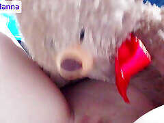 Innocent young girl plays with her teddy bear and her wet pussy with full lips