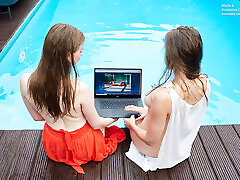 Girlfriends enjoy swimming naked together