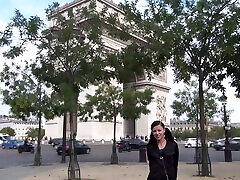 Vanessa , a pretty brunette, shows off on the Champs Elysees