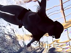Roxalana Chech in scuba diving in the pool