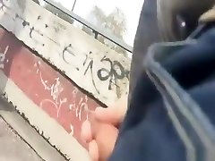 Pervert guy cums behind girl