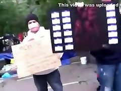 Half-naked chicks protesting against capitalism