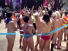 Naked students get ready to compete in a marathon