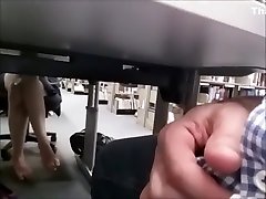 Horny office clerk jerks off under the table