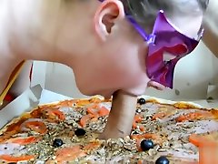 Over a slice of pizza she sensitively examines my foreskin and sucks cock