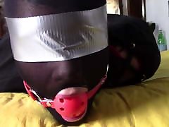 Laura XXX hogtied in panthyhose and high heels.