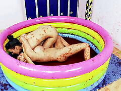 two friends rubbing against each other in swimming pool at home!