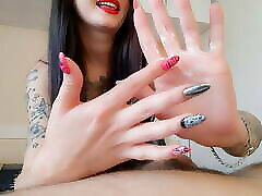 Handjob. Dominatrix Nika plays with her slave&039;s dick. The stay shot cums at the hands of the Dominatrix
