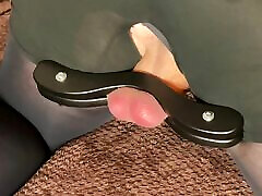 I spanks the balls of a fat slave, clamped in a humbler