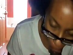 Awesome nerdy amateur black coed chick gives a really good blowjob