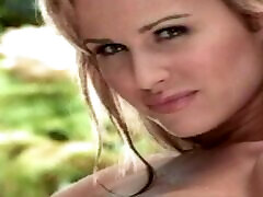 Brown-haired hottie Jennifer Walcott pours water on her astonishing body