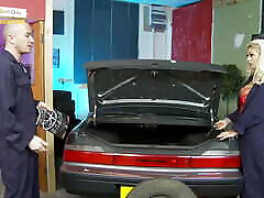 Blonde mechanic babe gets fucked while checking out car