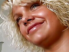 A beautiful blonde babe from Germany gets warm cum on her natural tits
